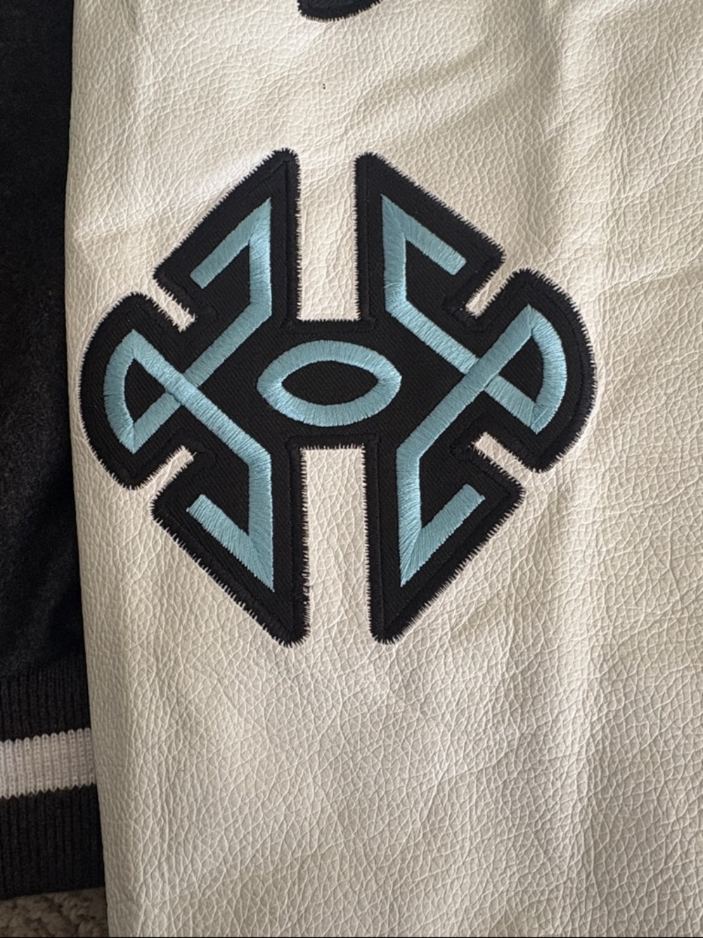 Black and White Varsity Jacket with Blue Appliqué - Picture 10 of 15